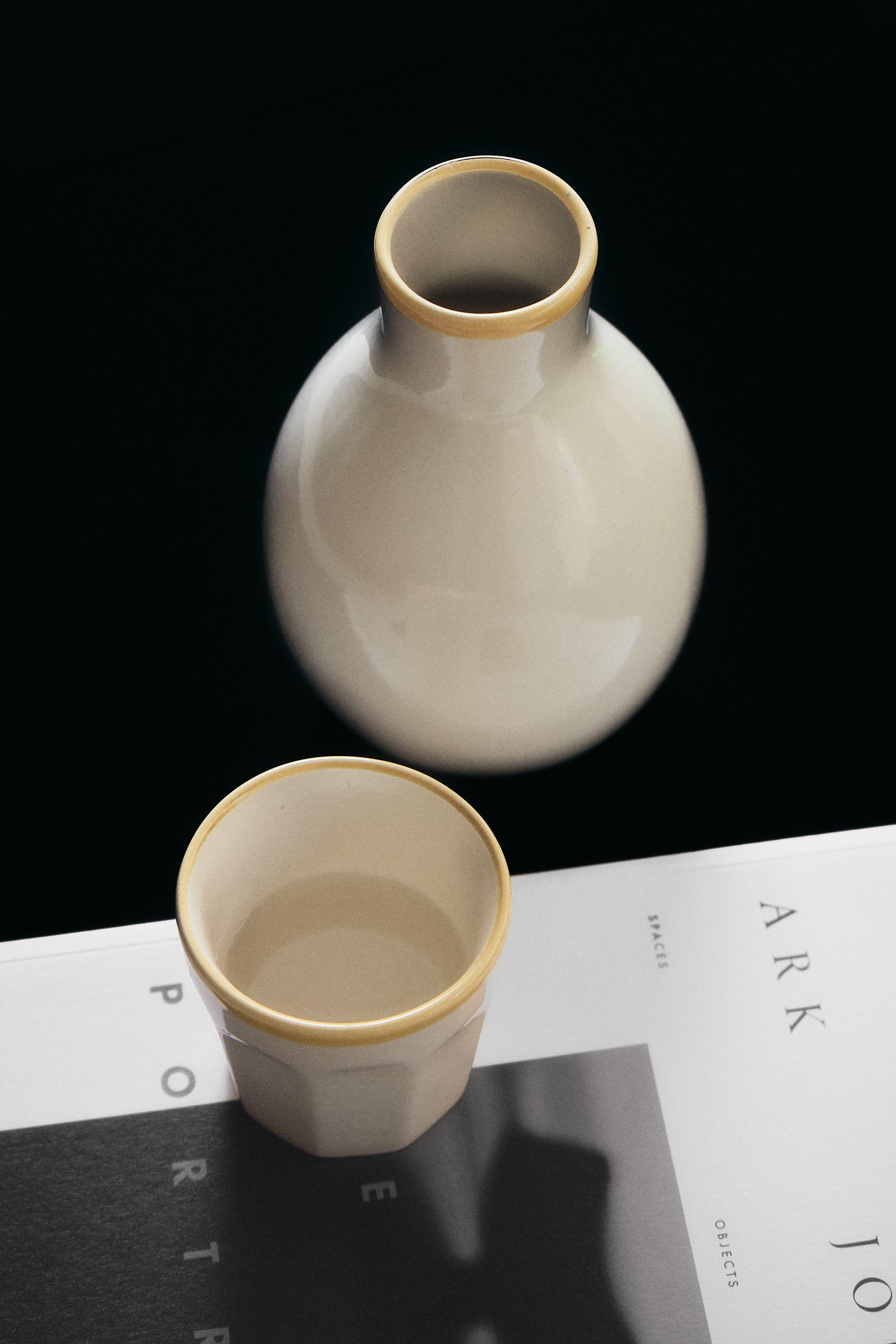 CERAMIC BOTTLE AND TUMBLER BEDSIDE SET